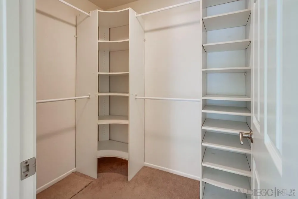 3924 Tortuga Cove Oceanside, CA 92058 - Photo 24 of 42 a view of an empty walk in closet