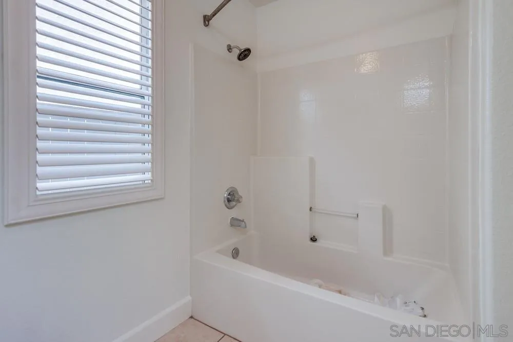 3924 Tortuga Cove Oceanside, CA 92058 - Photo 35 of 42 a bathroom with a bathtub