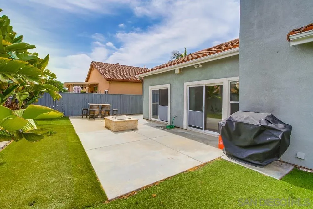 3924 Tortuga Cove Oceanside, CA 92058 - Photo 38 of 42 a front view of a house with swimming pool and porch
