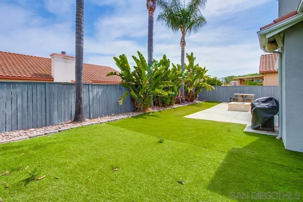 3924 Tortuga Cove Oceanside, CA 92058 - Photo 41 of 42 a view of a backyard with a garden and plants