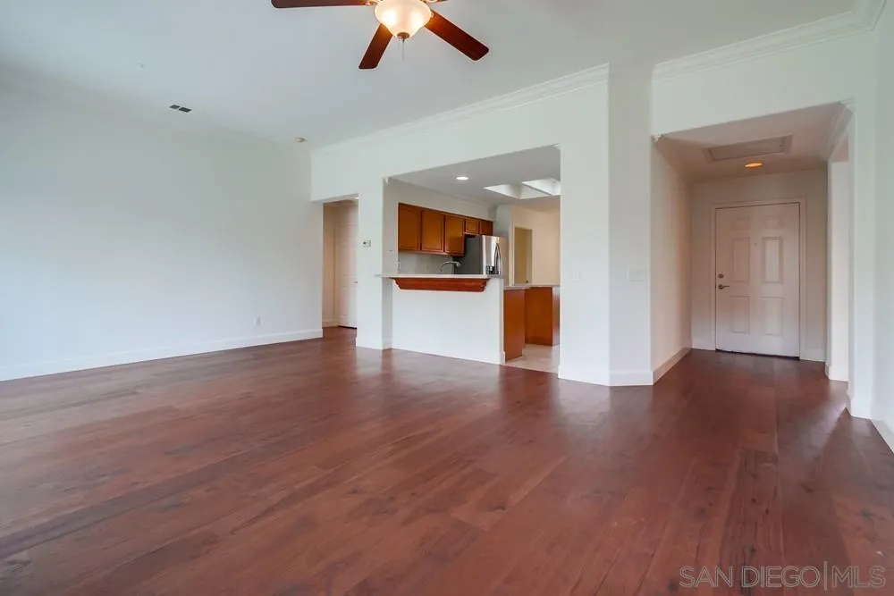 3924 Tortuga Cove Oceanside, CA 92058 - Photo 6 of 42 a view of empty room with wooden floor