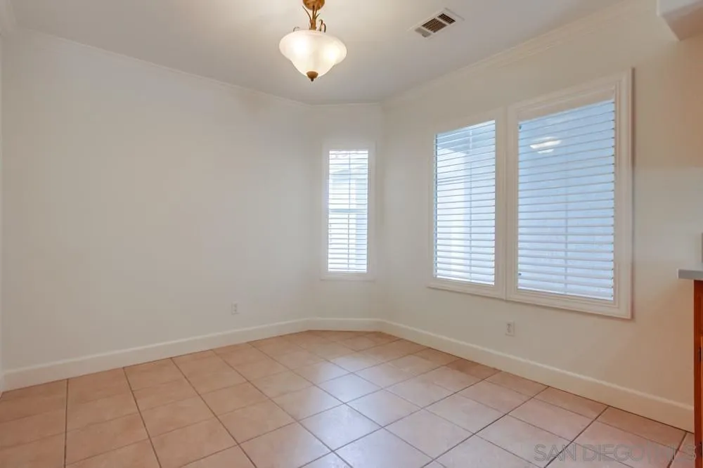 3924 Tortuga Cove Oceanside, CA 92058 - Photo 10 of 42 an empty room with a window