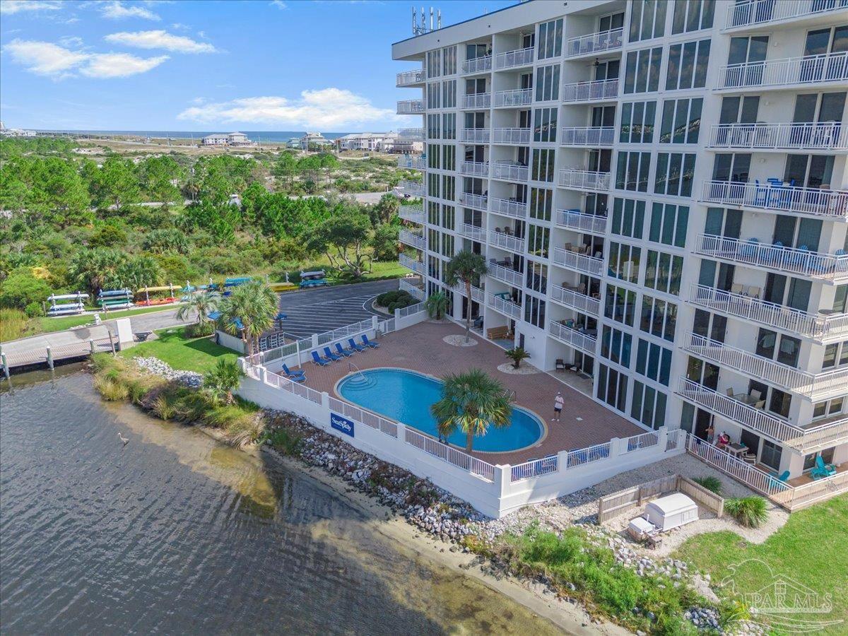 16284 Perdido Key Drive, Unit 112 Perdido Key, FL 32507 - Photo 4 of 37 a picture of a table and chairs