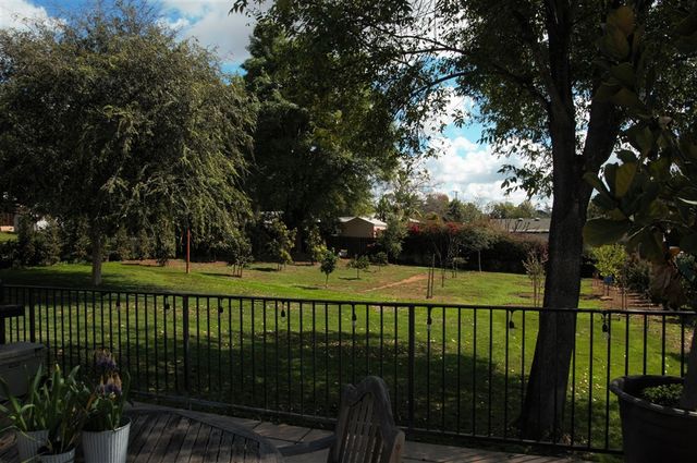 a view of a balcony with a garden