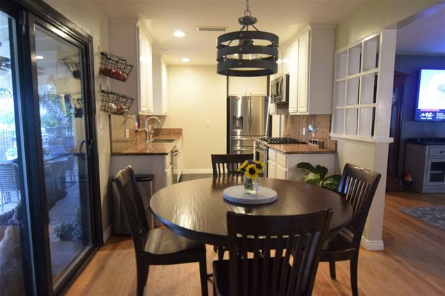 a view of a dining room with furniture