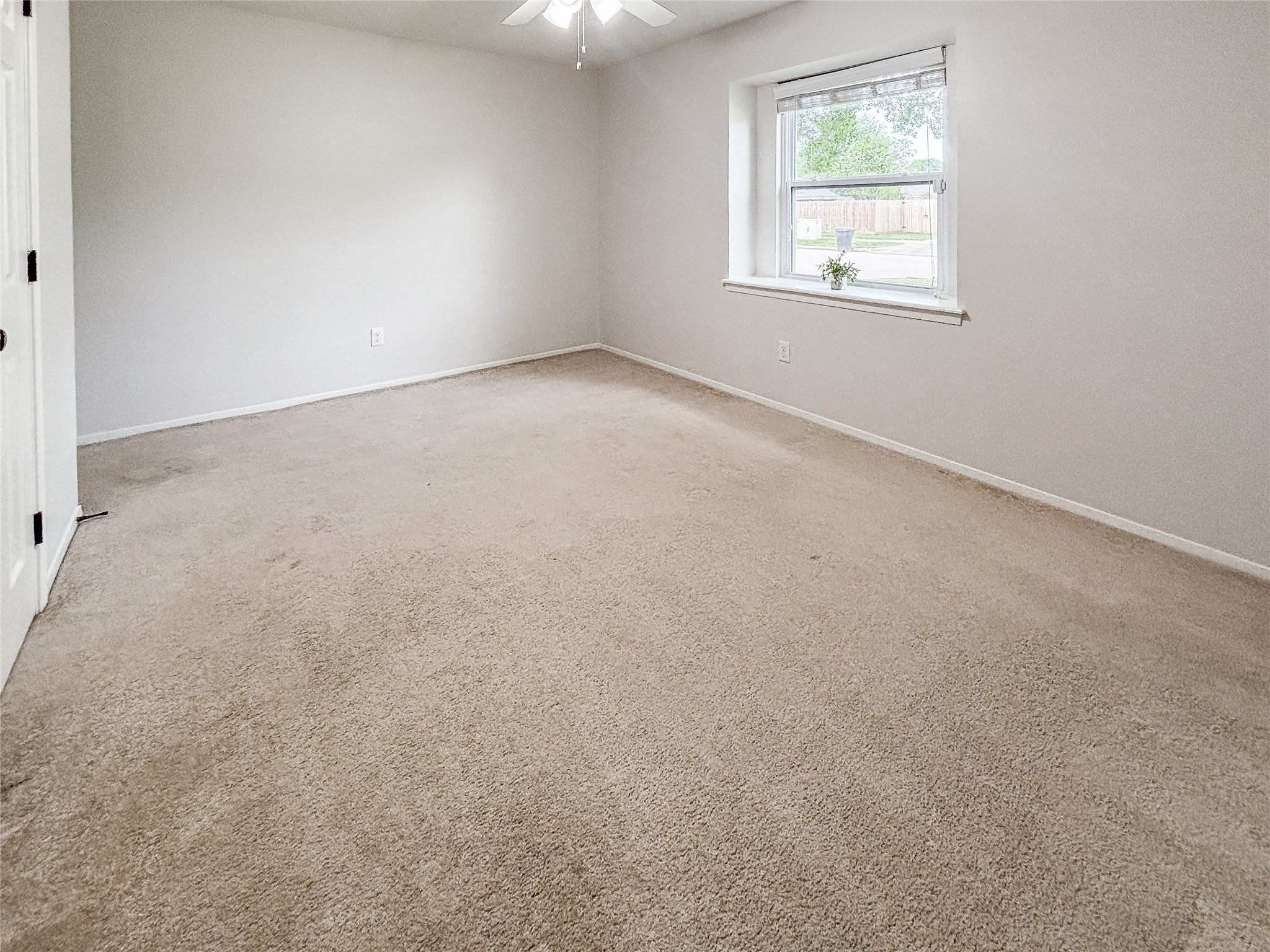 3123 Lazy Spring Drive Houston, TX 77080 - Photo 19 of 24 an empty room with a window