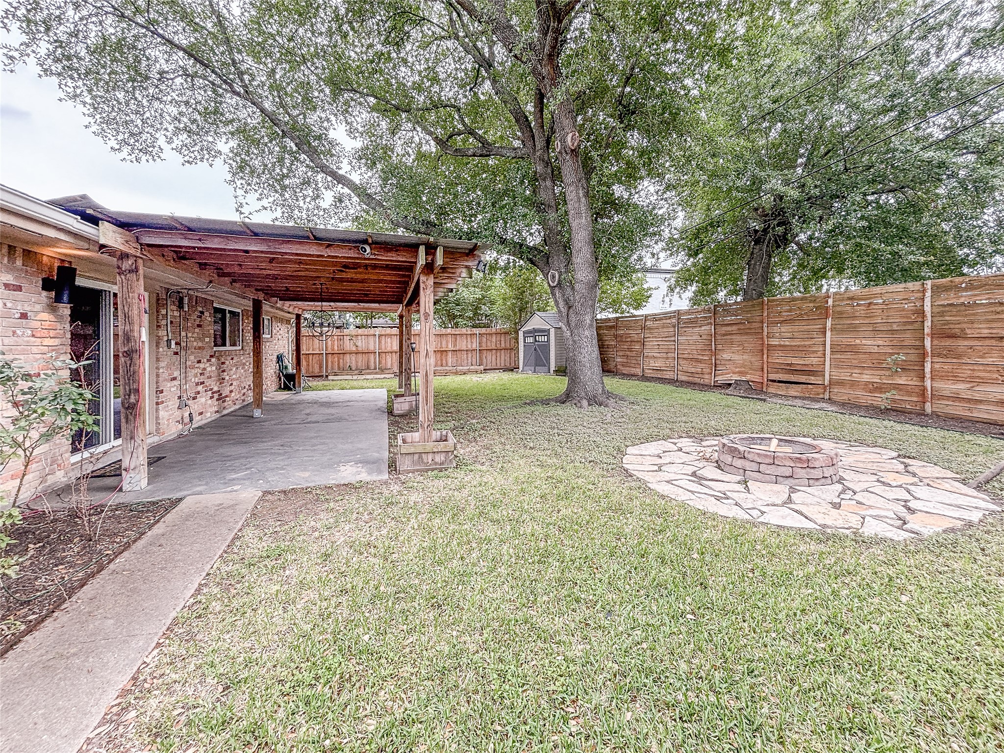3123 Lazy Spring Drive Houston, TX 77080 - Photo 22 of 24 a view of a backyard