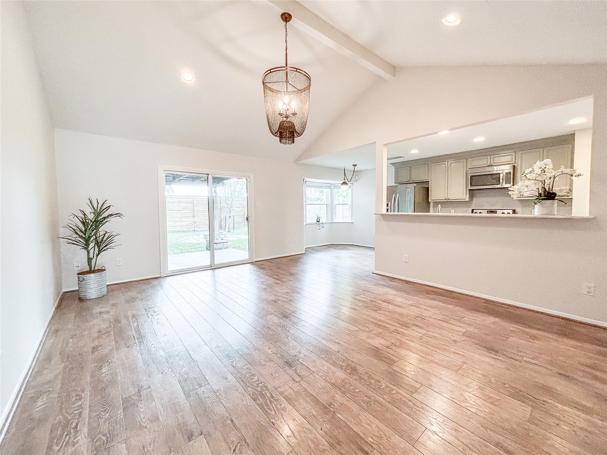 3123 Lazy Spring Drive Houston, TX 77080 - Photo 6 of 24 a view of a room with wooden floor and windows