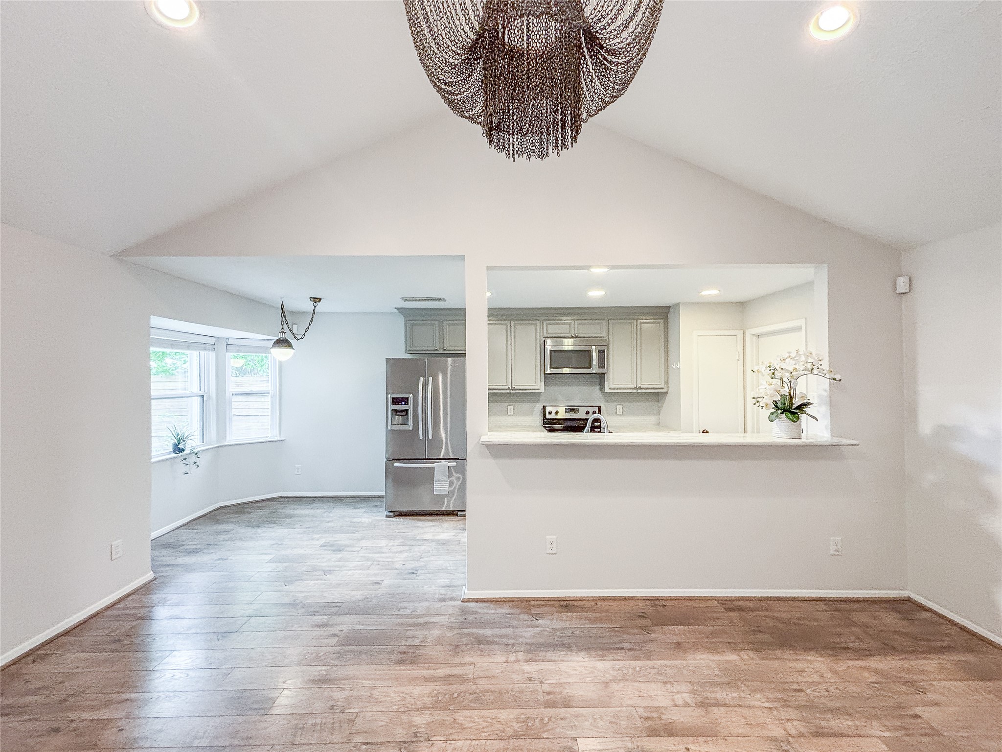 3123 Lazy Spring Drive Houston, TX 77080 - Photo 7 of 24 a view of kitchen and front door