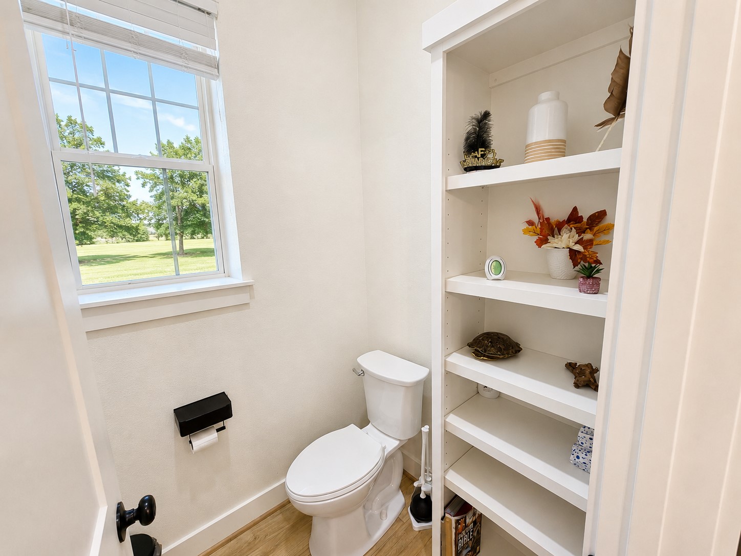 440 Farm To Market 223 Shepherd, TX 77371 - Photo 29 of 40 Custom cabinetry, upgraded quartz surfaces, decorative shelving, and contemporary farmhouse-inspired design