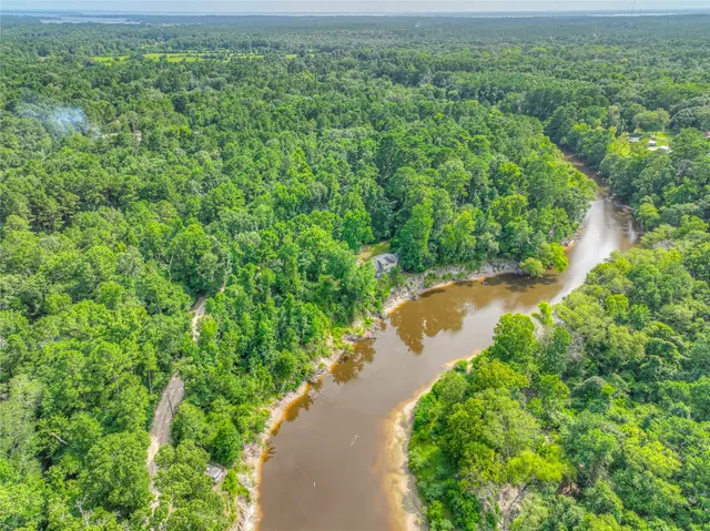 a view of a lake with a yard