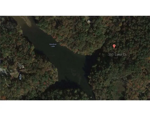 a black and white photo of a house