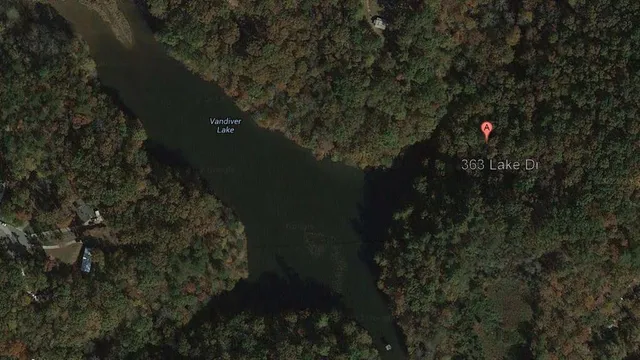 a view of a house in a yard