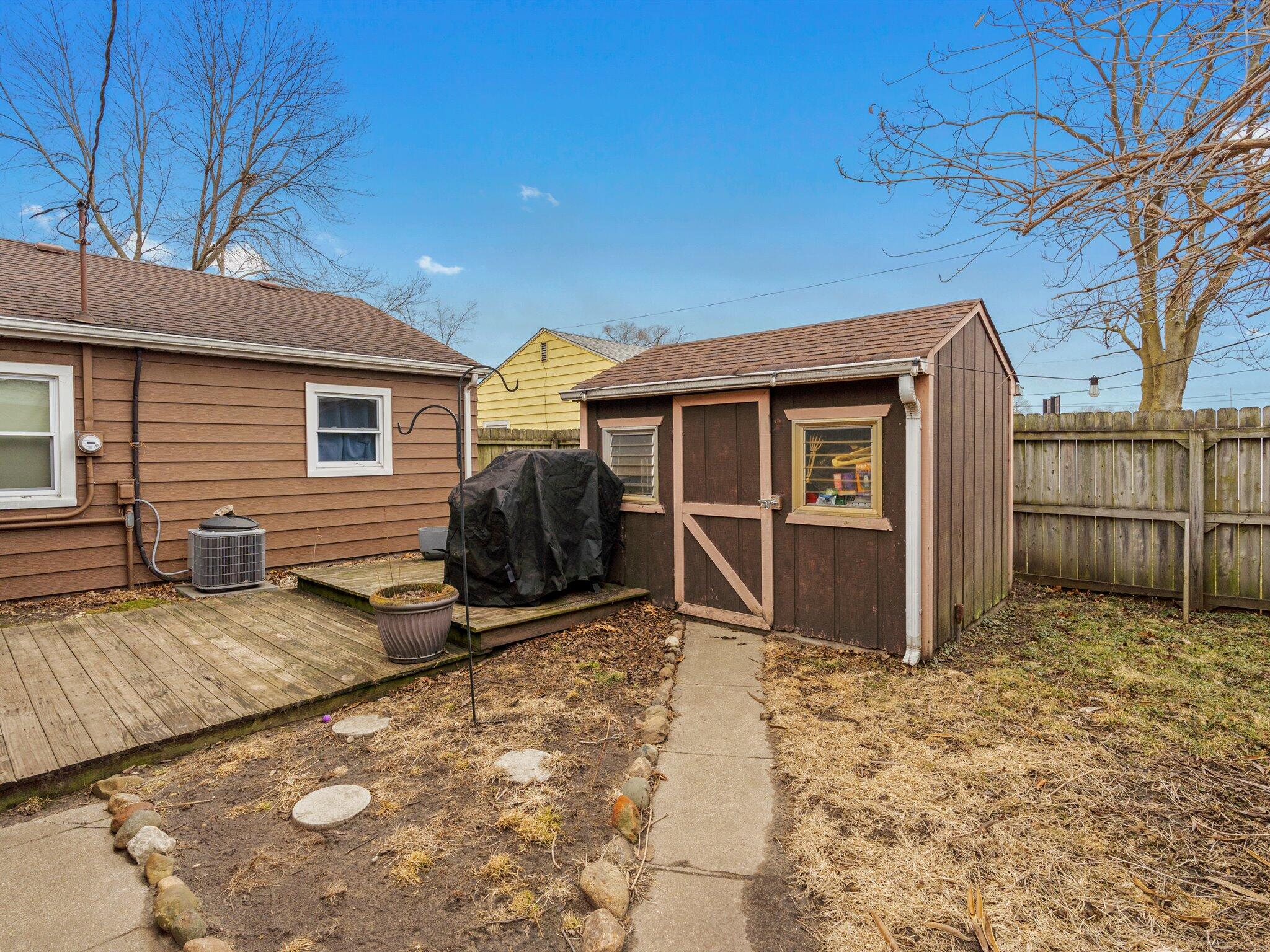 614 West Elm Street Griffith, IN 46319 - Photo 15 of 16 a view of a house with a yard