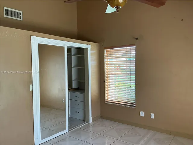 a view of back yard of the house