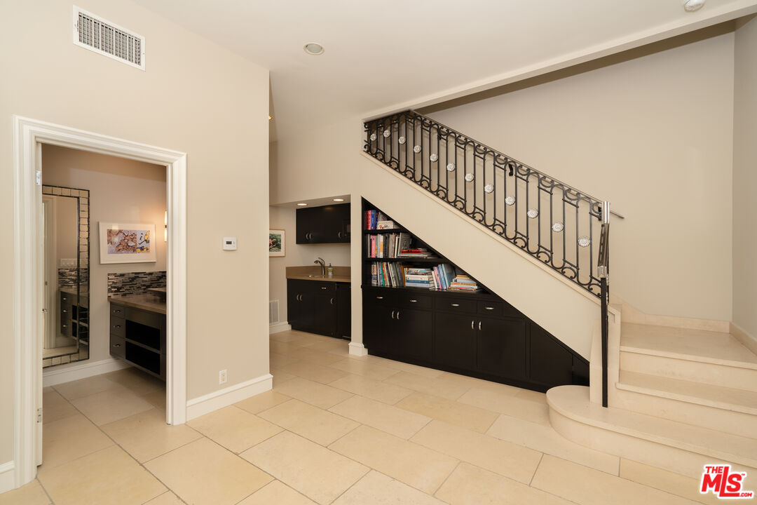 722 North Elm Drive Beverly Hills, CA 90210 - Photo 39 of 51 a view of entryway and hall with a window