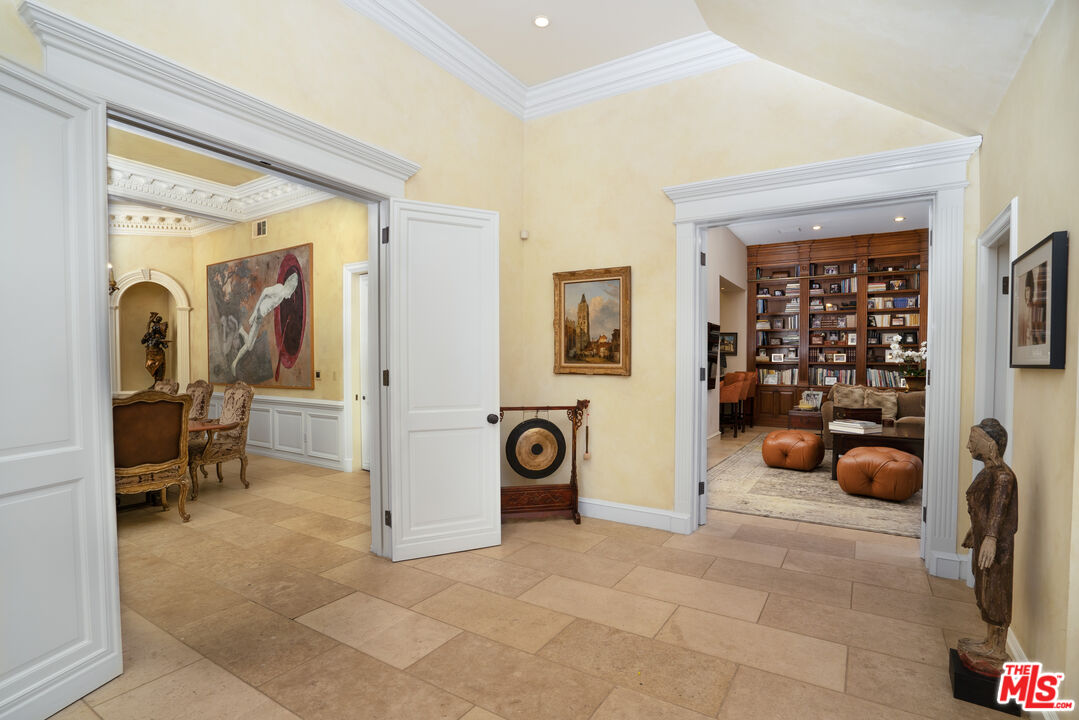 722 North Elm Drive Beverly Hills, CA 90210 - Photo 10 of 51 a view of a livingroom with couch and furniture