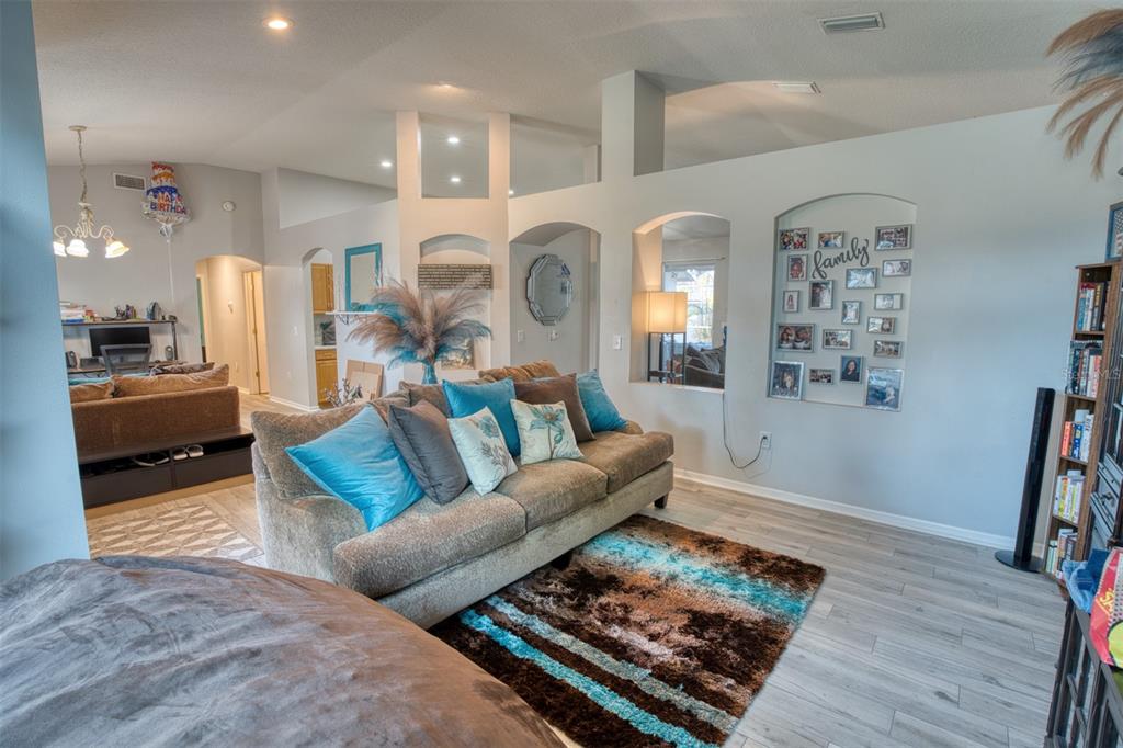 4303 Orange Ridge Court Valrico, FL 33596 - Photo 7 of 40 a living room with furniture and a rug