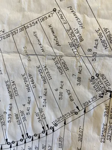 a view of a golf course with a big yard