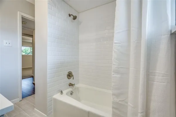 a bathroom with a bathtub