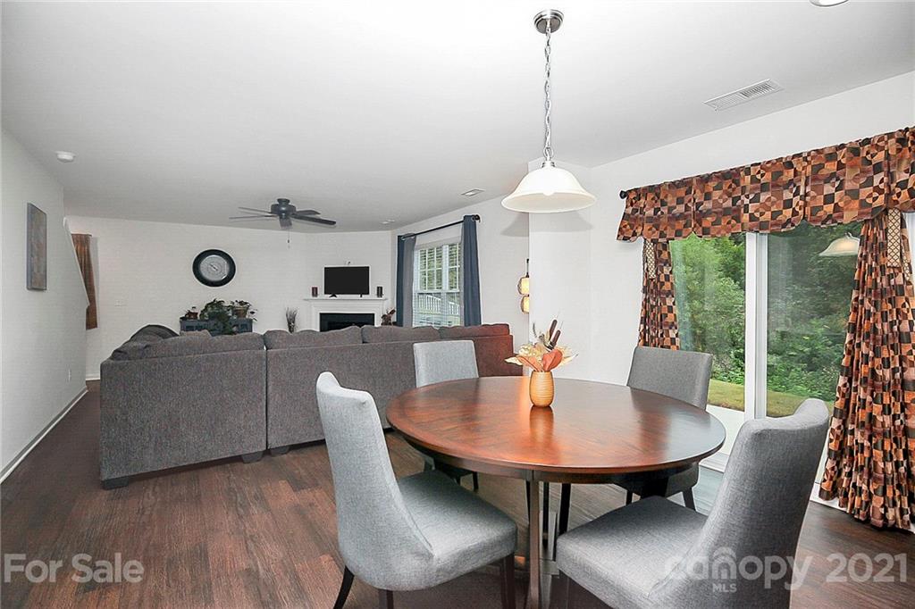 8036 Starnes Randall Road Charlotte, NC 28215 - Photo 13 of 45 a dining room with furniture and window