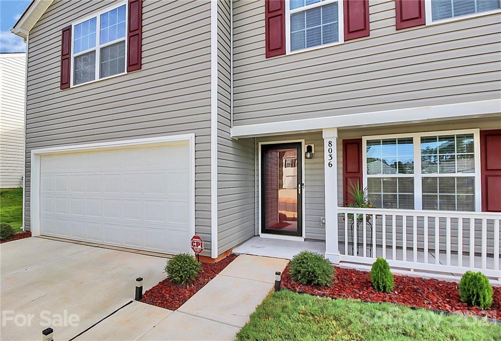8036 Starnes Randall Road Charlotte, NC 28215 - Photo 3 of 45 a front view of a house