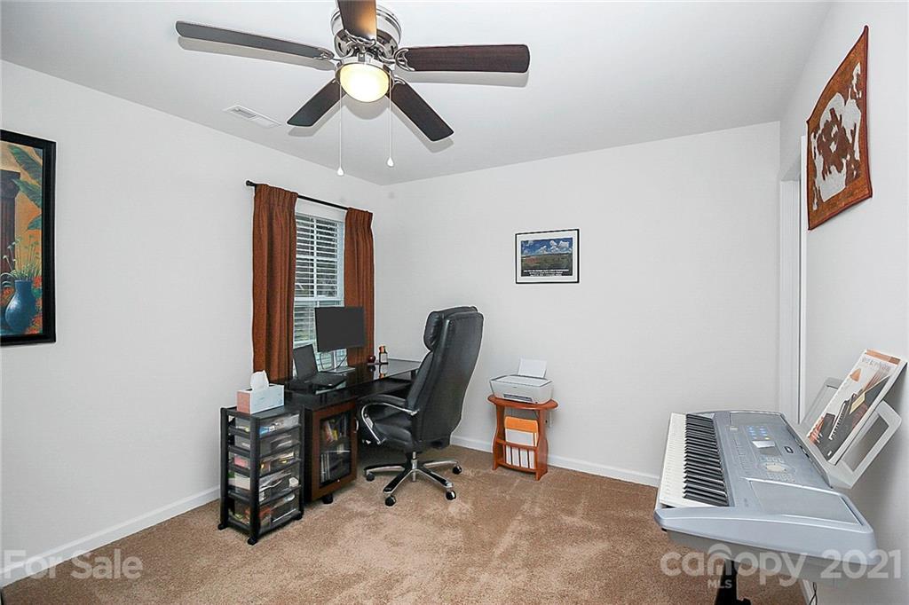 8036 Starnes Randall Road Charlotte, NC 28215 - Photo 25 of 45 a view of a workspace with furniture