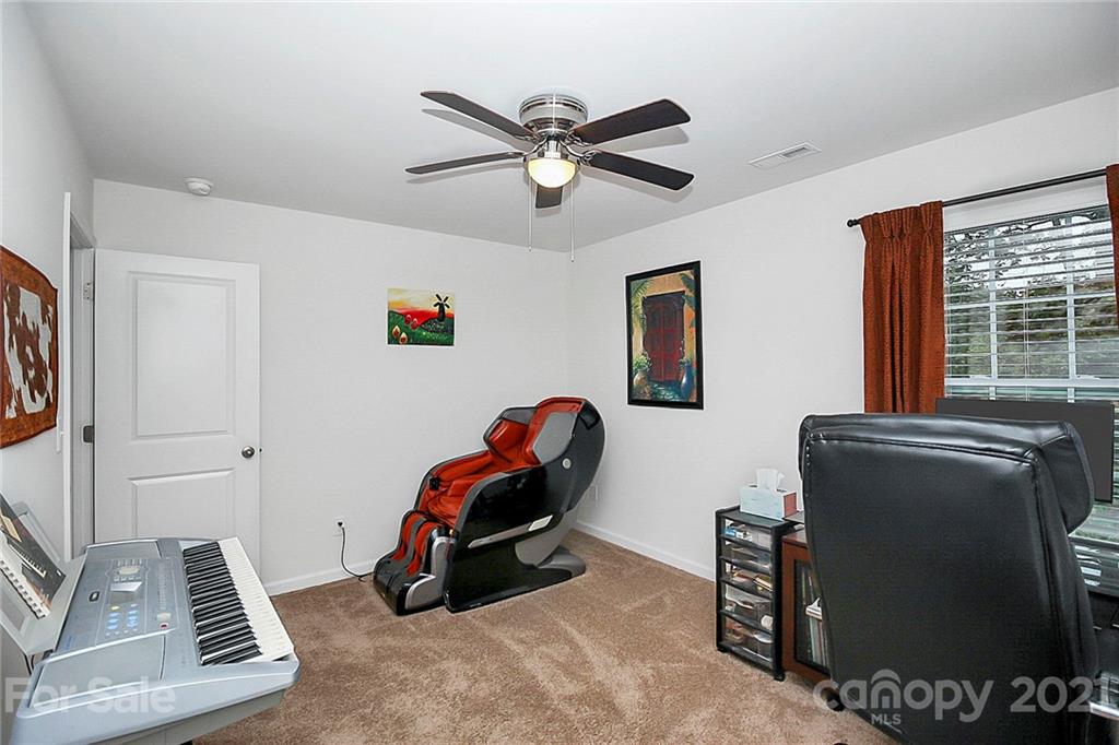 8036 Starnes Randall Road Charlotte, NC 28215 - Photo 26 of 45 a room with furniture and windows
