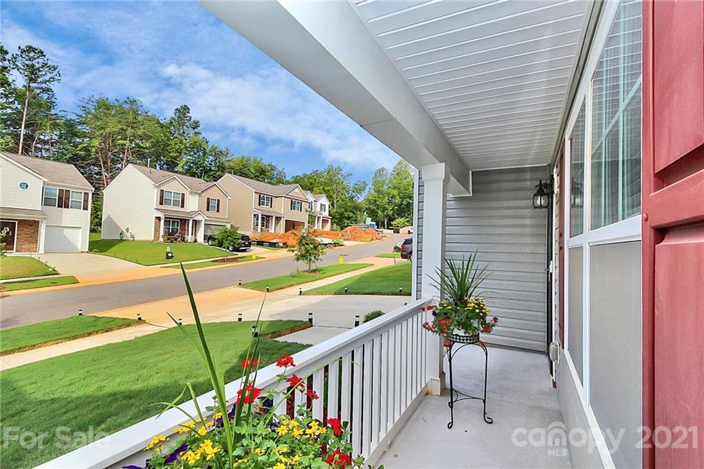 8036 Starnes Randall Road Charlotte, NC 28215 - Photo 4 of 45 a view of a porch and garden