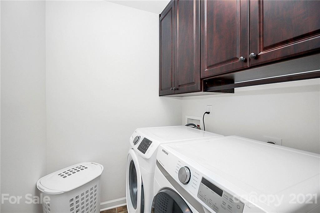 8036 Starnes Randall Road Charlotte, NC 28215 - Photo 31 of 45 a utility room with dryer and washer