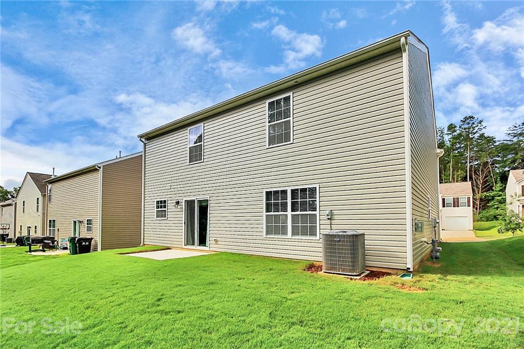 8036 Starnes Randall Road Charlotte, NC 28215 - Photo 39 of 45 a front view of house with yard