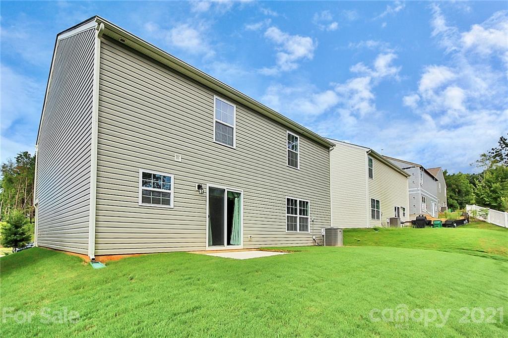 8036 Starnes Randall Road Charlotte, NC 28215 - Photo 40 of 45 a view of a house with backyard