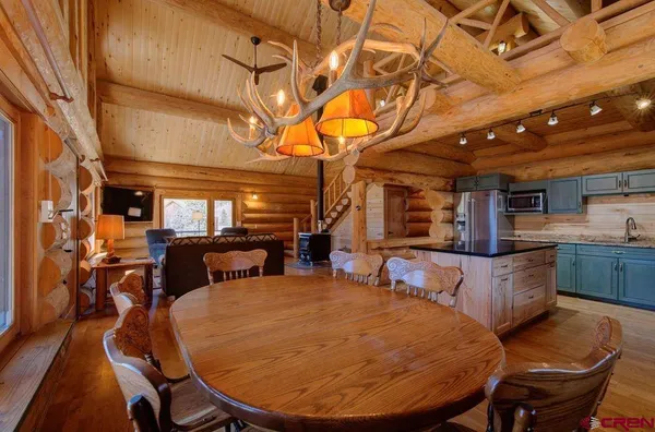 a bedroom with a bed and a night stand