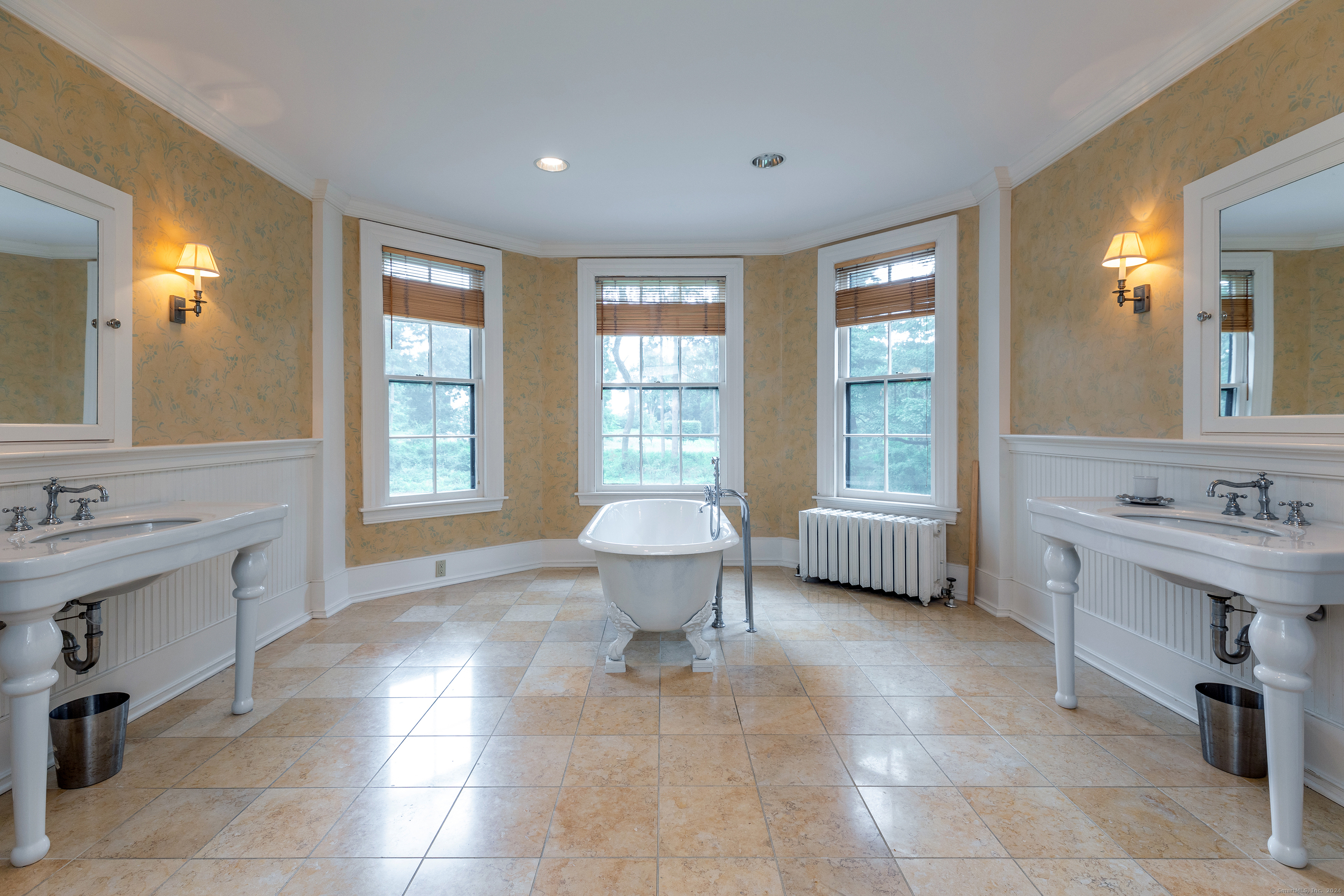 79 Hilltop Road Sharon, CT 06069 - Photo 15 of 31 a spacious bathroom with a tub sink and mirror