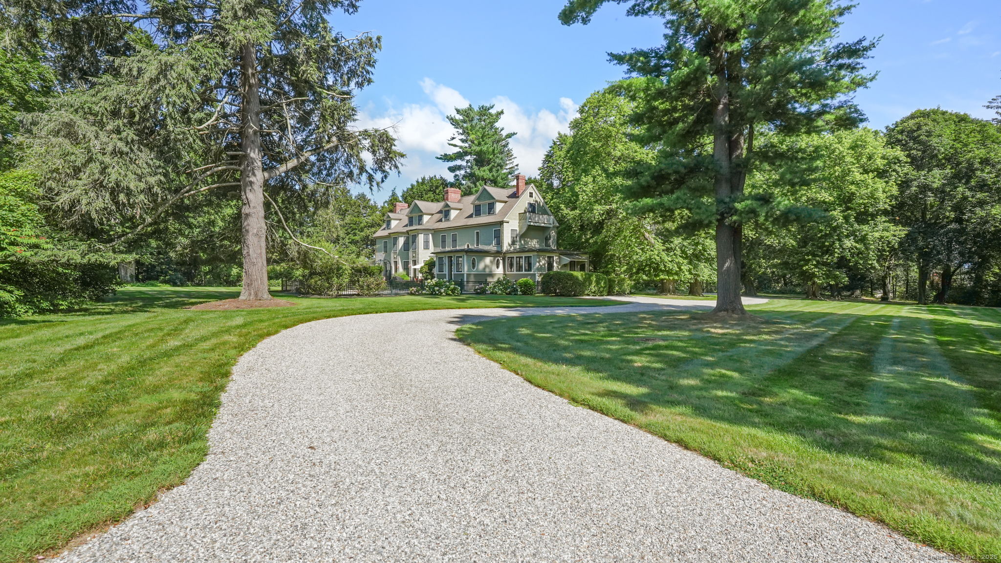 79 Hilltop Road Sharon, CT 06069 - Photo 2 of 31 a view of a park with large trees