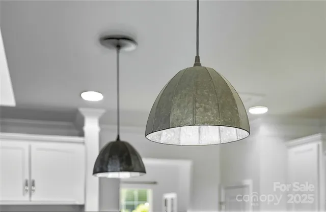 a workspace with wooden floor and a window