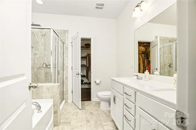 a bath tub sitting next to a window