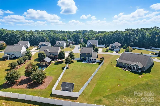 a house with trees in the background