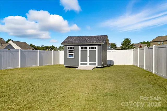 an aerial view of multiple houses with a terrace