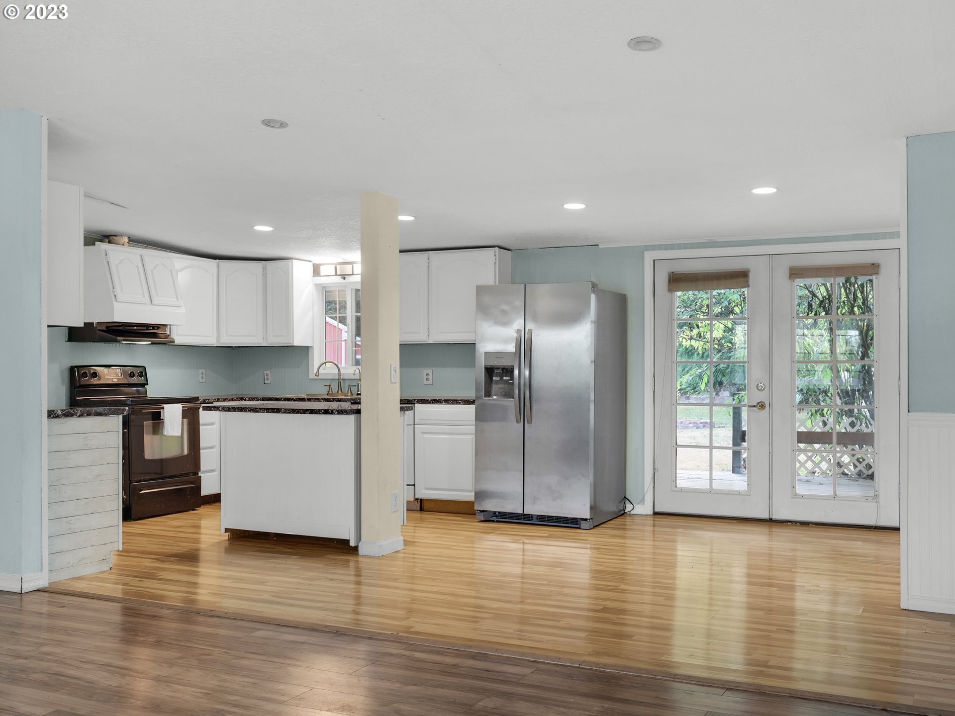 92287 Walluski Loop Astoria, OR 97103 - Photo 2 of 39 a kitchen with stainless steel appliances granite countertop a refrigerator and a stove