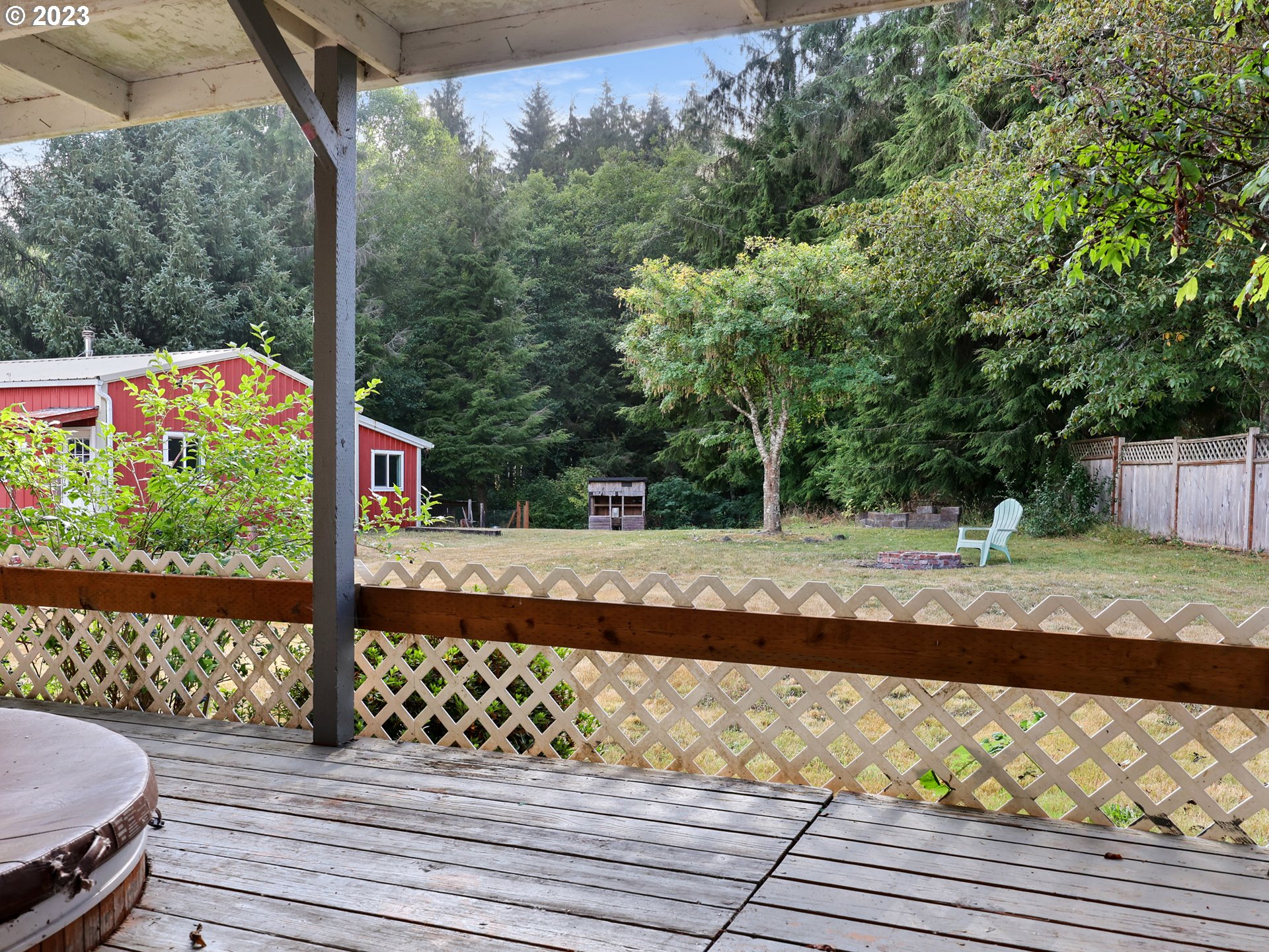 92287 Walluski Loop Astoria, OR 97103 - Photo 23 of 39 a view of a yard with street