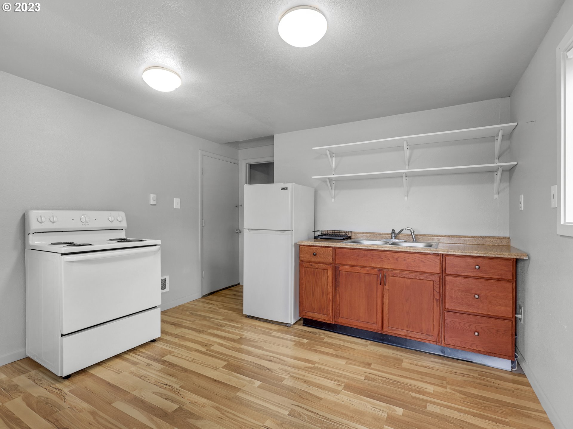 92287 Walluski Loop Astoria, OR 97103 - Photo 26 of 39 a room with storage and utility