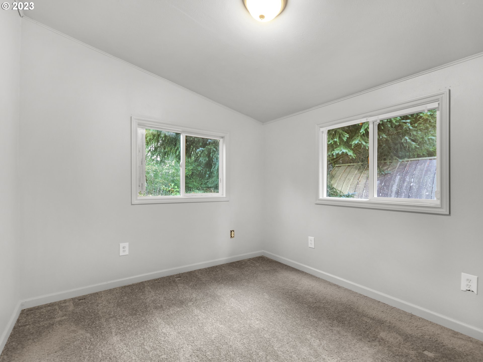 92287 Walluski Loop Astoria, OR 97103 - Photo 32 of 39 an empty room with a window