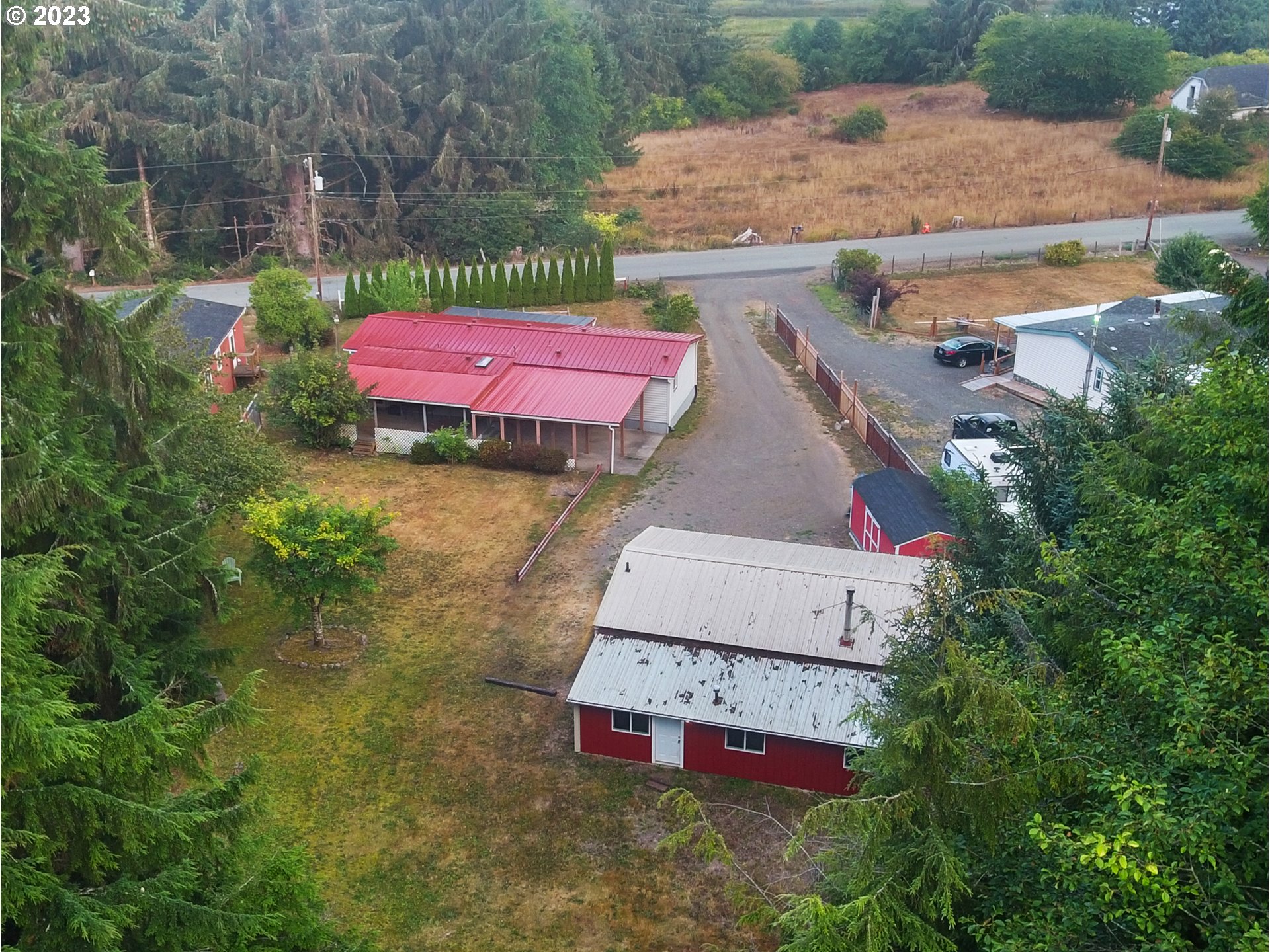 92287 Walluski Loop Astoria, OR 97103 - Photo 37 of 39 an aerial view of a house with outdoor space