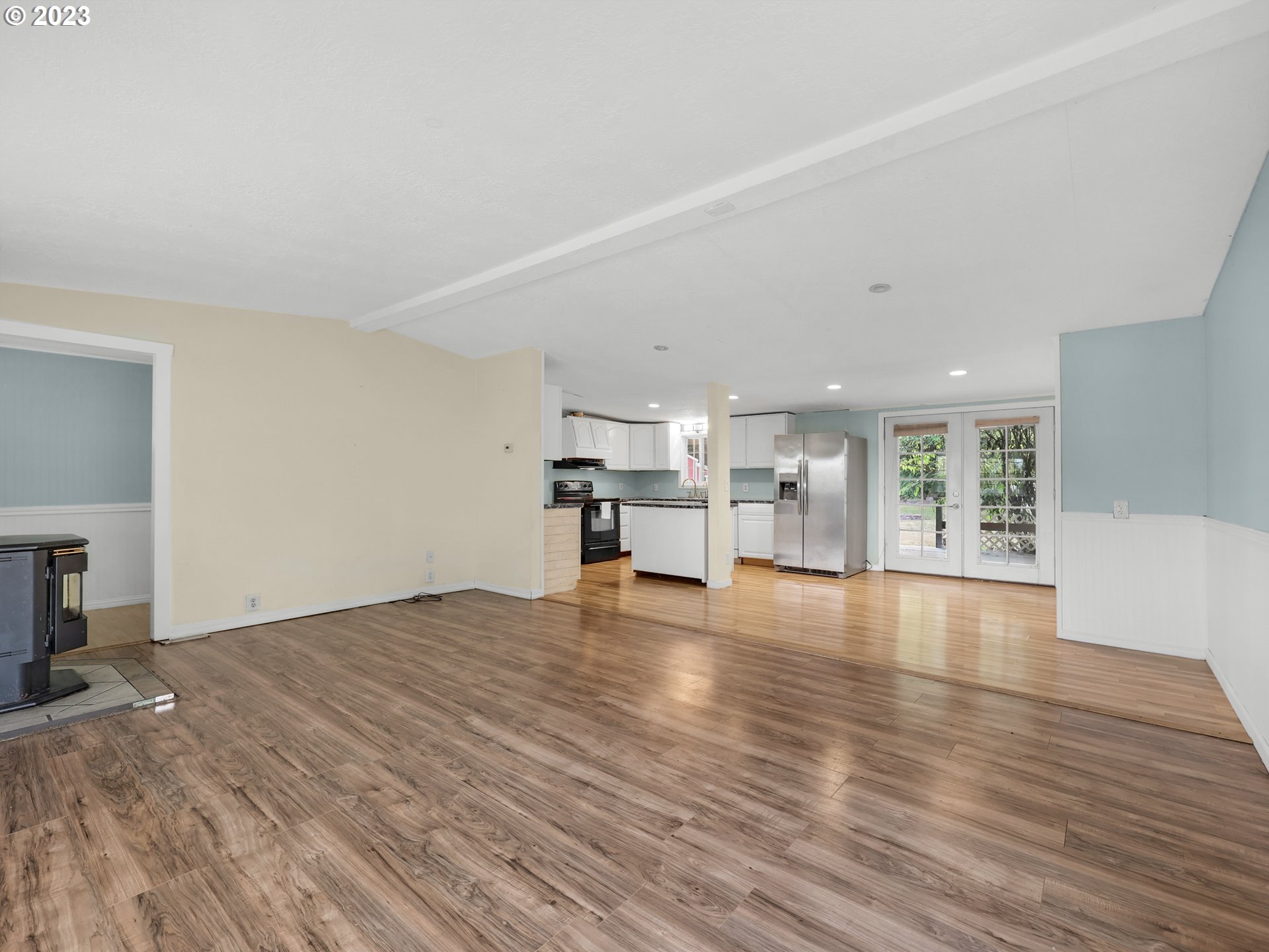 92287 Walluski Loop Astoria, OR 97103 - Photo 7 of 39 a view of empty room with wooden floor