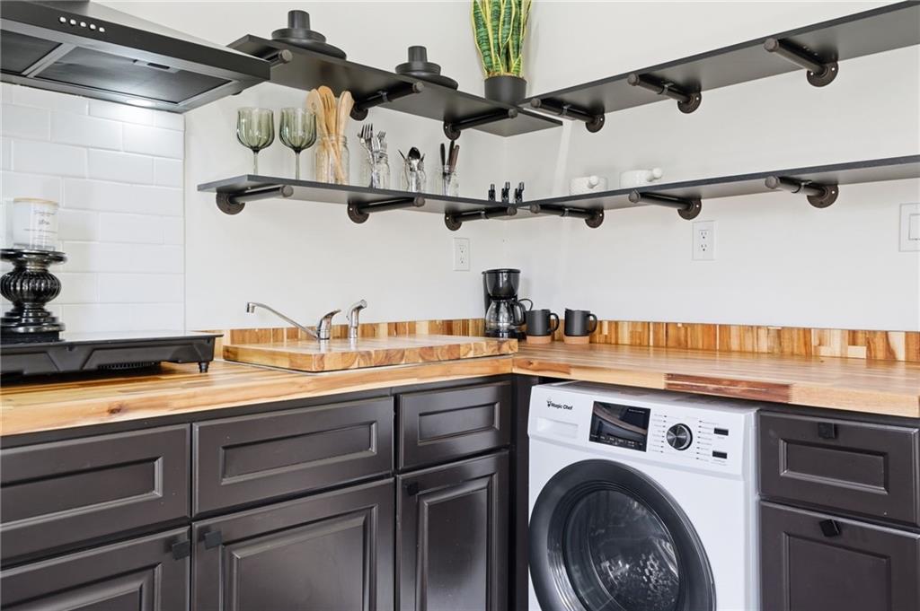 710 Lumber Company Road Talking Rock, GA 30175 - Photo 11 of 27 a view of a storage and utility room with lots of racks on the wall