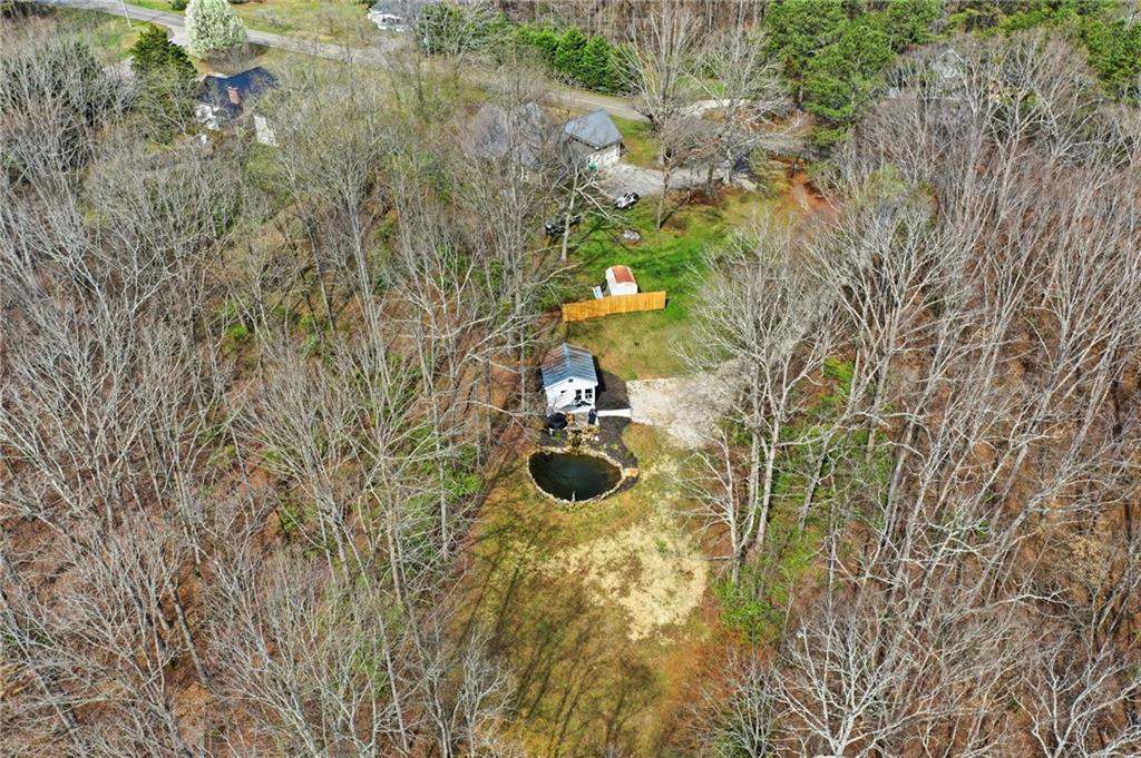 710 Lumber Company Road Talking Rock, GA 30175 - Photo 26 of 27 a backyard of a house with lots of green space