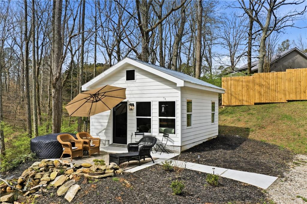 710 Lumber Company Road Talking Rock, GA 30175 - Photo 4 of 27 a view of a house with backyard