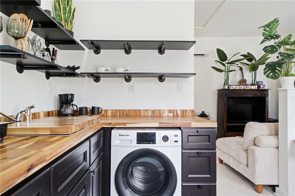 710 Lumber Company Road Talking Rock, GA 30175 - Photo 10 of 27 a kitchen with cabinets and a stove