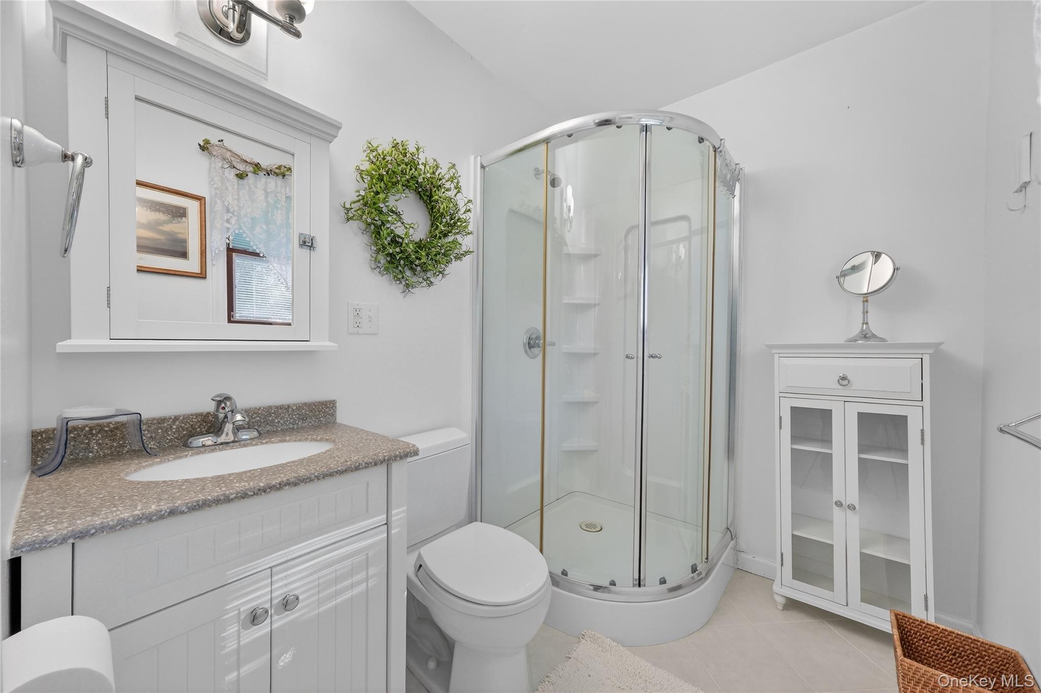 123 Fleury Road Pine Bush, NY 12566 - Photo 25 of 46 Full bathroom with a stall shower, vanity, and light tile patterned floors